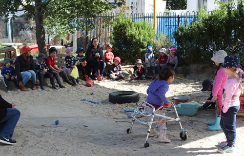 Kids playing in sandpit at Girrabanya