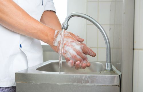 Person washing their hands