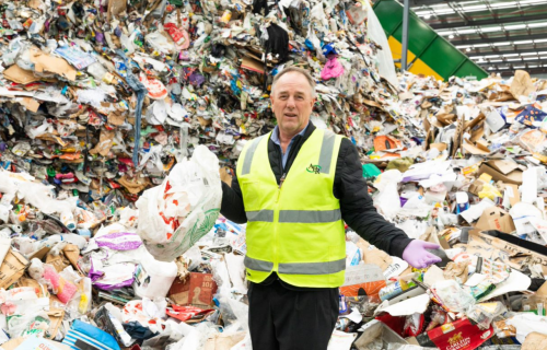A plastic problem: APR Managing Director Darren Thorpe with plastic bags contaminating our recycling.