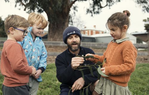 City of Ballarat Vegetation Officer Tony Marshall with Bakery Hill Kindergarten children Jack Benson, Rex Rampton and Willow Plucke