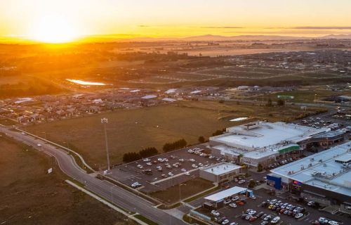 Ariel view of Delacombe Town Centre and surrounding area at sun set