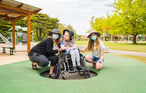 Children use the inclusive play equipment at Victoria Park