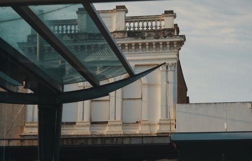 Photo of modern architecture in Bridge Mall with heritage building behind