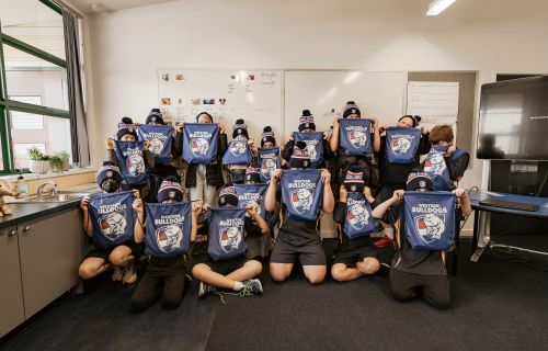 Canadian Lead Primary School students with Bulldogs flags