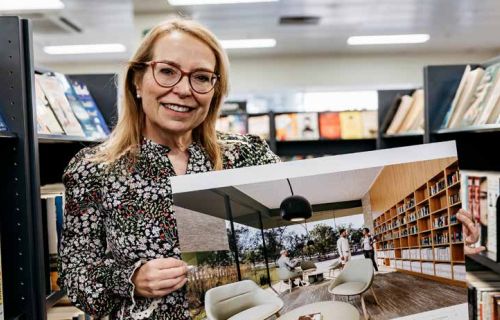 City of Ballarat's Libraries and Lifelong Learning Executive Manager Jenny Fink with a digital rendering of one of the spaces inside the planned new Wendouree Library and Learning Centre, designed to replace the existing library at Stockland Wendouree.