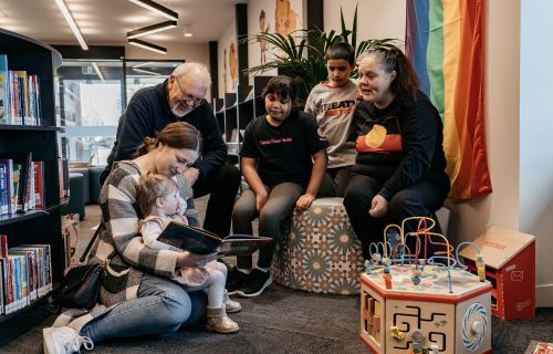 Emily Duffy with Chelsea Tiley, John Williams, Samara and Samuel Zakkam and their mother Rachel Muir at the Sebastopol Library.