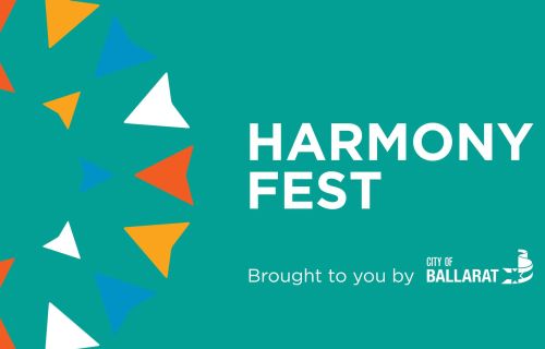 Text of harmony fest on a blue-green background
