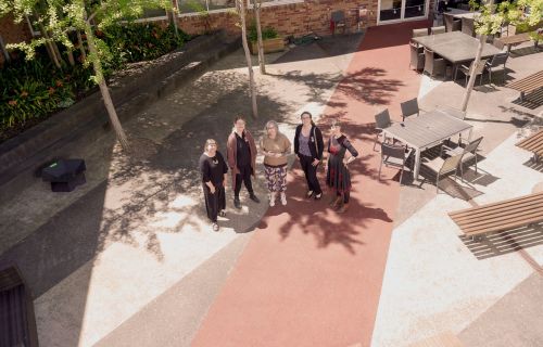 Image of the The Yarning Group - Lou Ridsdale, Shannen Mennen and Lyndel Ward in the Courtyard space at Barkly Square