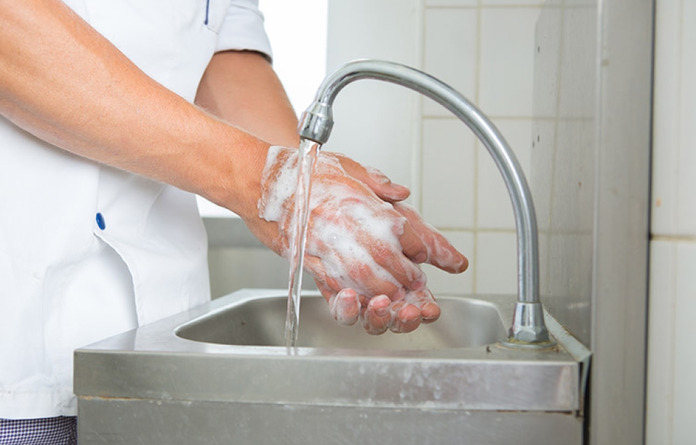 Person washing their hands