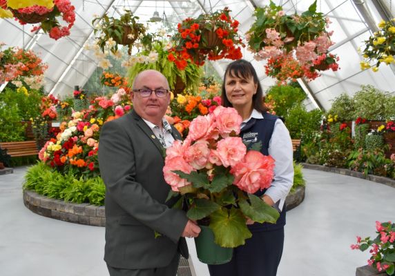 Cr Des Hudson with curator Donna Thomas and some spectacular Begonias.