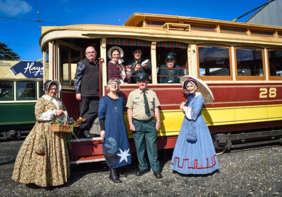 Mayor on tram with Sovereign Hill representatives in period costumes