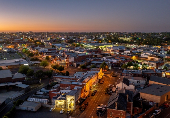 An aerial image of Main Road, Bakery Hill in the early evening.