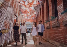 Generic image of a group of people in a laneway