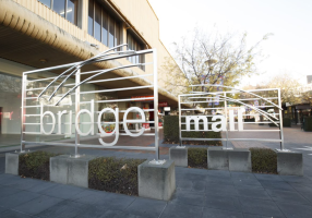 The entrance sign to the Bridge Mall