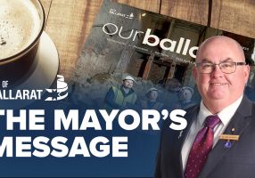 Text with The Mayor's Message with an image of Mayor Cr Des Hudson in front of an ourballarat magazine