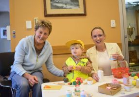 Cr Amy Johnson with grandpartent Jane and grandson Sonny as part of the Ageless Play Intergenerational Playgroup activity.