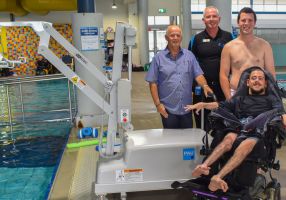 City of Ballarat Deputy Mayor, Cr Peter Eddy, Ballarat Aquatic and Lifestyle Centre manager Gerald Dixon, Pinarc Disability Support physiotherapist Isaac Hanneysee and the first user of the new hoist Lucas.