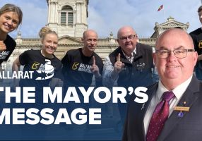 Text with The Mayor's Message with an image of Mayor Cr Des Hudson in front of an image of Ballarat marathon runner at Town Hall
