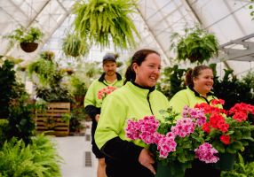 gardners in the greenhouse at the botanical gardens