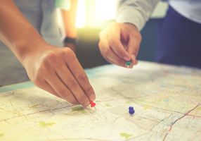 People planning on a map