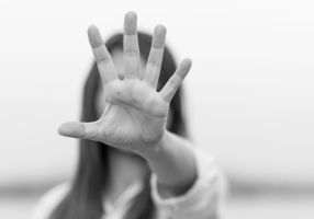 Women with hand up