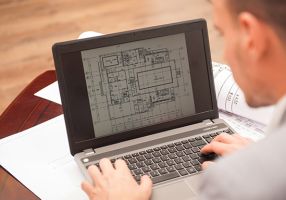 Man looking at a laptop screen