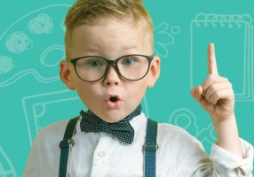 Small boy with finger raised