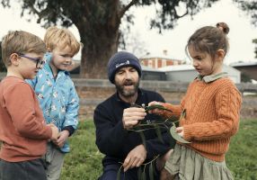 City of Ballarat Vegetation Officer Tony Marshall with Bakery Hill Kindergarten children Jack Benson, Rex Rampton and Willow Plucke