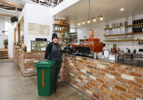 GroundUp Coffee Recyclers founder Eliza Whitburn-Weber with The Hydrant Food Hall owner Sam Rowe