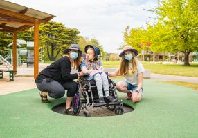 Children use the inclusive play equipment at Victoria Park