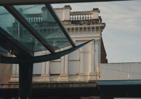 Photo of modern architecture in Bridge Mall with heritage building behind