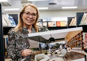 City of Ballarat's Libraries and Lifelong Learning Executive Manager Jenny Fink with a digital rendering of one of the spaces inside the planned new Wendouree Library and Learning Centre, designed to replace the existing library at Stockland Wendouree.