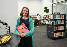 Joanne Lockwood standing at the entrance to Ballarat library at town hall