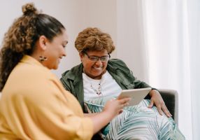 Older people socialising using an ipad
